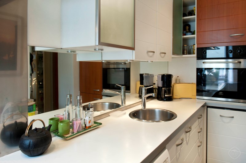 Kitchen Counter with Sink and Cabinets Chic Saint Germain apartment Paris