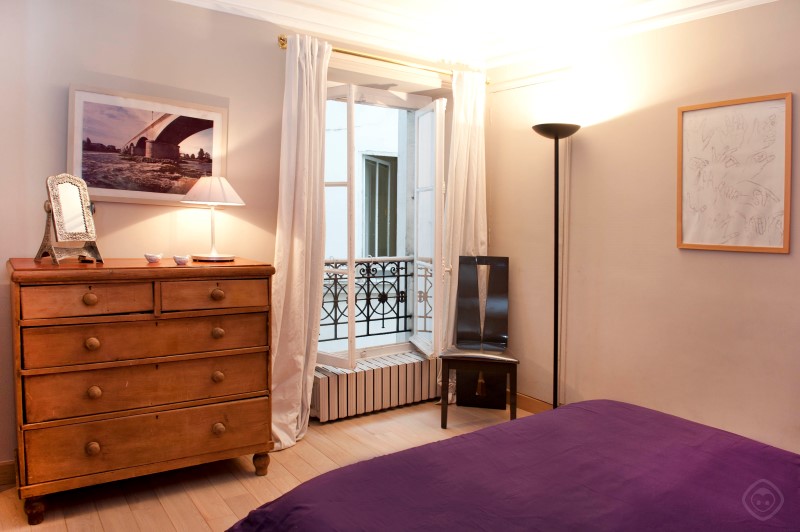 Bedroom with Cabinet, Seating and Window View Chic Saint Germain apartment Paris