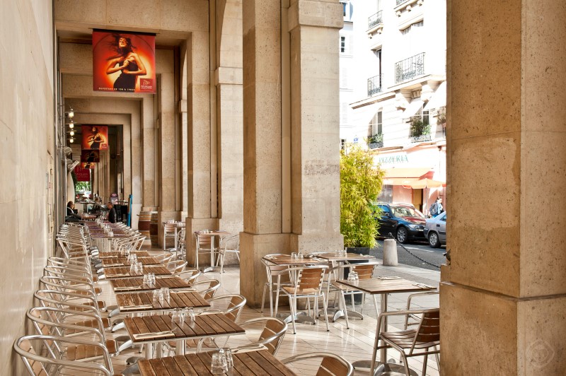 Neighborhood Street with Outdoor Dining Chic Saint Germain apartment Paris